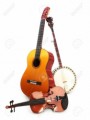 23145987-stringed-music-instruments-guitar-banjo-violin-on-a-white-background-Stock-Photo5ac3c03ba64d1